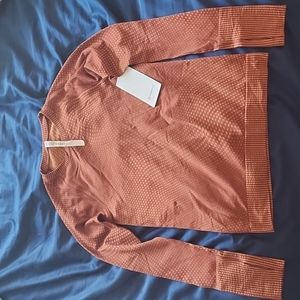 Lululemon rest less pullover, size 6, orange/brown